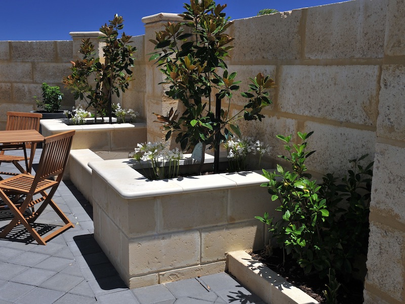 limestone wall with planter box secret harbour