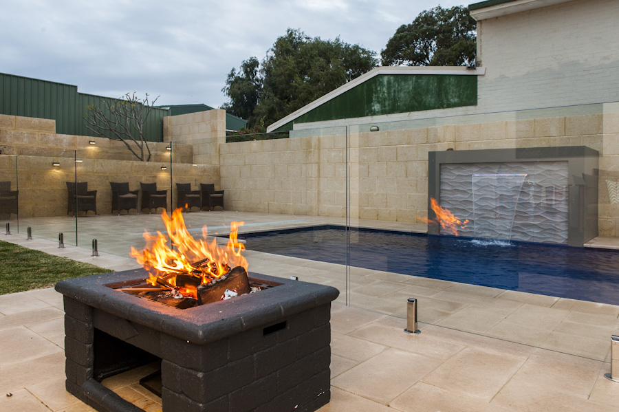 Limestone Retaining wall around swimming pool area